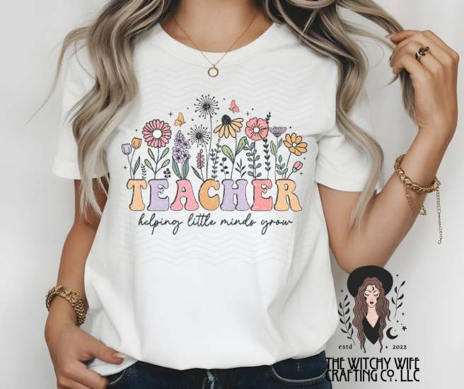 TEACHER HELPING LITTLE MINDS GROW