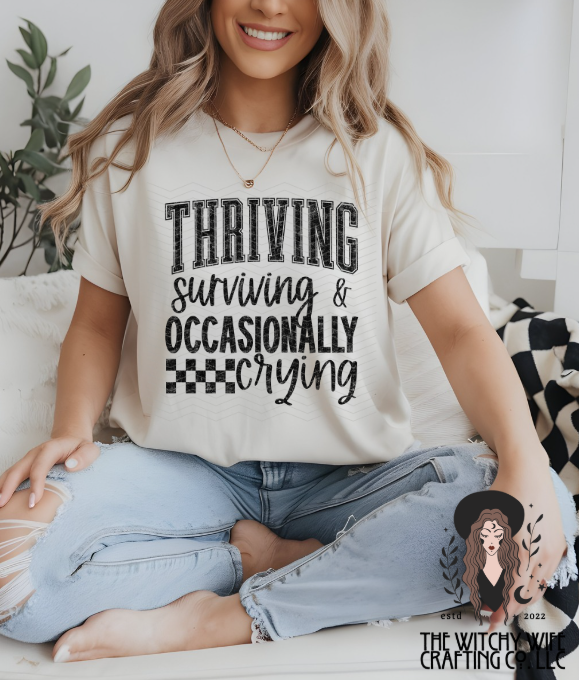 THRIVING SURIVING & OCCASIONALLY CRYING